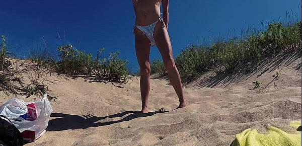  PISS PISS TRAVEL - Russian nudist girl Sasha Bikeyeva pissing on a public beach Doninos on Galicia Spain